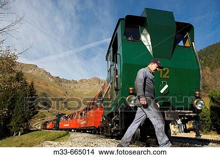 Picture - Cog railway Rothorn Bahn between Brienz and Brienzer Rothorn peak. Swiss alps. Switzerland.. Fotosearch