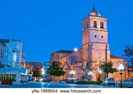 Colegiata de San Miguel, Saint Michael's church in the Plaza de Espaa during night, at Aguilar de Campoo, Palencia, Castilla y Leon, Spain. View Large Photo Image Picture - Colegiata de San Miguel, Saint Michael's church in the Plaza de Espaa during night, at Aguilar de Campoo, Palencia, Castilla y Leon, Spain.. Fotosearch