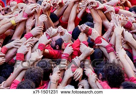 Colla Joves Xiquets de Valls? Castellers? building human tower, a Catalan tradition Fira de Santa Teresa, town festival Pla? a Vella El Vendrell Tarragona province, Spain View Large Photo Image Stock Image - Colla Joves Xiquets de Valls? Castellers? building human tower, a Catalan tradition Fira de Santa Teresa, town festival Pla? a Vella El Vendrell Tarragona province, Spain. Fotosearch
