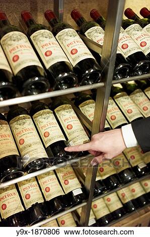 Collection of Petrus wines in a wine cellar View Large Photo Image Stock Photograph - Collection of Petrus wines in a wine cellar. Fotosearch