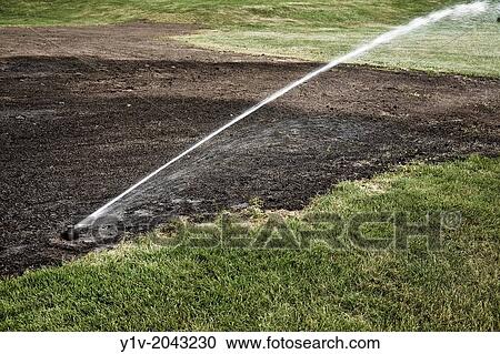 College athletic field being watered. View Large Photo Image Stock Image - College athletic field being watered.. Fotosearch