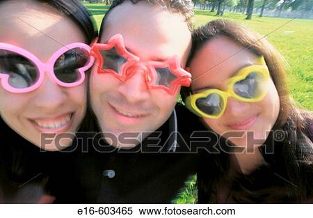 College friends with silly glasses View Large Photo Image Stock Photography - College friends with silly glasses. Fotosearch