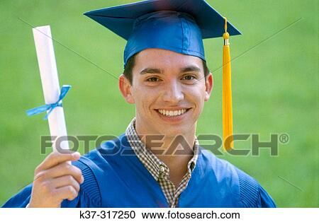 College graduate at graduation ceremony on campus View Large Photo Image Stock Image - College graduate at graduation ceremony on campus. Fotosearch