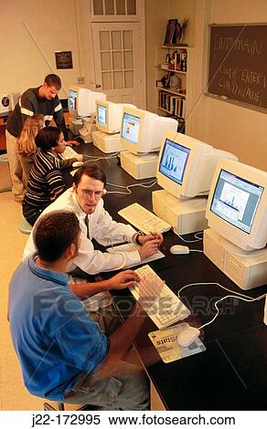 College professor and students in computer lab View Large Photo Image Stock Photography - College professor and students in computer lab. Fotosearch
