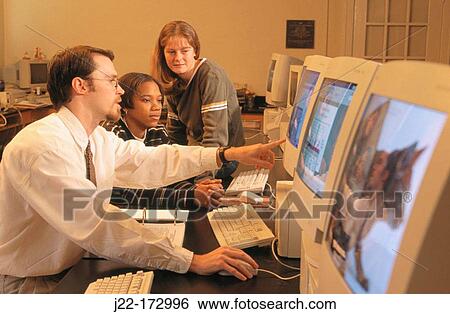 College professor wirh students in computer laboratory. Tennessee. USA View Large Photo Image Stock Photograph - College professor wirh students in computer laboratory. Tennessee. USA. Fotosearch