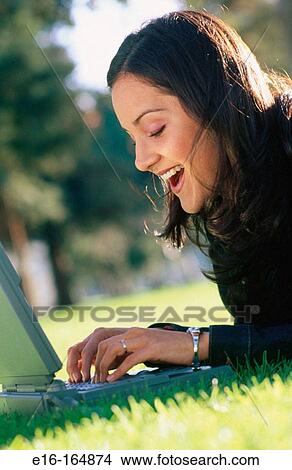 Picture - College student working on computer. Fotosearch