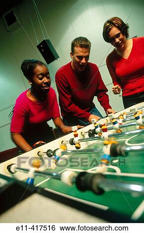 College students play football. View Large Photo Image Stock Photograph - College students play football.. Fotosearch