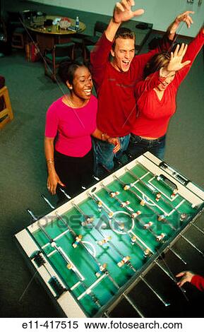 College students play football. View Large Photo Image Stock Photography - College students play football.. Fotosearch