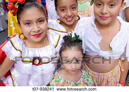 Stock Image - Colombian dance group wearing? polleras?, a folkloric costume, Annual Hispanic Day Parade on 5th Avenue, New York City, Celebrating the Hispanic Heritage.. Fotosearch