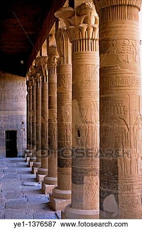 Colonnade marking the entrance to the ancient remains of a temple for Isis on the island of Philae on the Nile river, Egypt View Large Photo Image Stock Photo - Colonnade marking the entrance to the ancient remains of a temple for Isis on the island of Philae on the Nile river, Egypt. Fotosearch