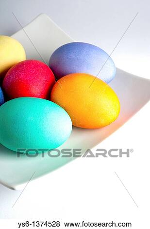 Colored Easter Eggs on a White Plate View Large Photo Image Stock Photo - Colored Easter Eggs on a White Plate. Fotosearch