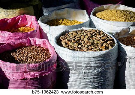 Colorful bags with vegetables and pasta in bulk in a market in Fez, Morocco, Africa View Large Photo Image Stock Image - Colorful bags with vegetables and pasta in bulk in a market in Fez, Morocco, Africa. Fotosearch