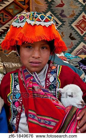 Colorful child in traditional clothes and hats in small town of Pisaq Peru View Large Photo Image Stock Photograph - Colorful child in traditional clothes and hats in small town of Pisaq Peru. Fotosearch