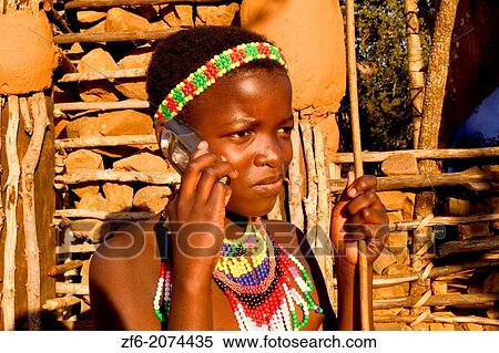 Colorful Child with Cell Phone in Native Zulu Tribe at Shakaland Center South Africa. View Large Photo Image Stock Photography - Colorful Child with Cell Phone in Native Zulu Tribe at Shakaland Center South Africa.. Fotosearch