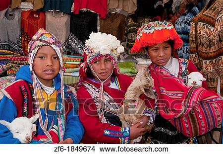 Colorful children in traditional clothes and hats in small town of Pisaq Peru View Large Photo Image Picture - Colorful children in traditional clothes and hats in small town of Pisaq Peru. Fotosearch