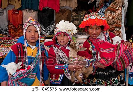 Colorful children in traditional clothes and hats in small town of Pisaq Peru View Large Photo Image Stock Photography - Colorful children in traditional clothes and hats in small town of Pisaq Peru. Fotosearch