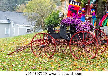 Colorful decorated waggon in autumn, Stowe, Vermont, USA View Large Photo Image Stock Photo - Colorful decorated waggon in autumn, Stowe, Vermont, USA. Fotosearch