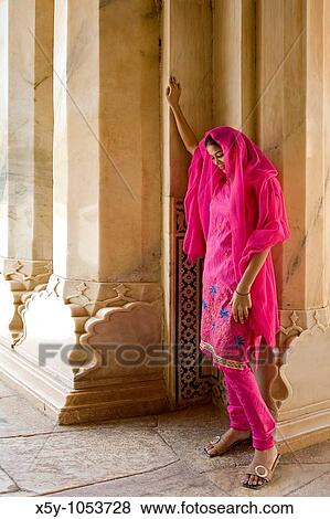 Colorful Hindu woman at Amber Fort temple in Rajasthan Jaipur India View Large Photo Image Stock Photo - Colorful Hindu woman at Amber Fort temple in Rajasthan Jaipur India. Fotosearch