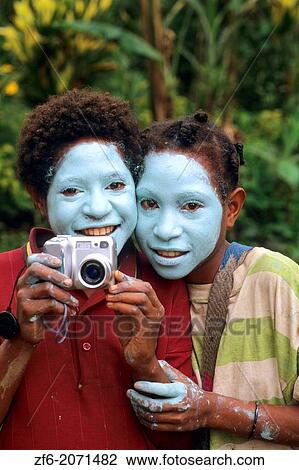Colorful Huli kids of Papua New Guinea with Digital Camera. View Large Photo Image Stock Image - Colorful Huli kids of Papua New Guinea with Digital Camera.. Fotosearch