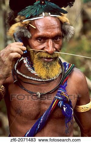 Colorful Huli Wigmen of Papua New Guinea with Cell Phone. View Large Photo Image Stock Image - Colorful Huli Wigmen of Papua New Guinea with Cell Phone.. Fotosearch