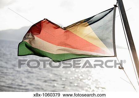 Stock Photo - Colorful national flag of Seychelles. Fotosearch