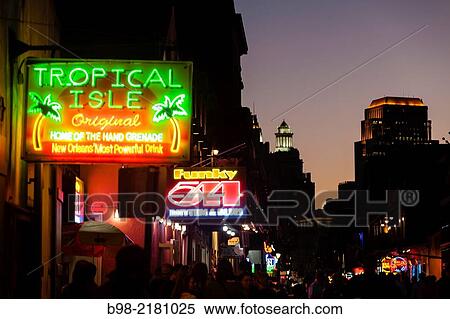 Stock Photography - Colorful neon signs advertising various night spots, in the New Orleans' French Quarter.. Fotosearch