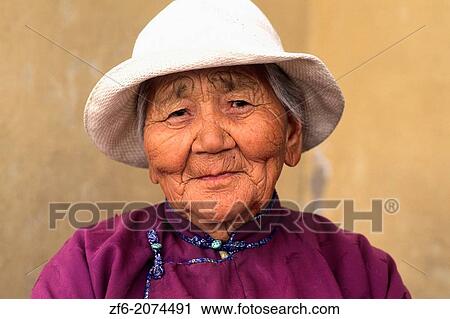 Stock Image - Colorful Old Native Woman Ulaan Baatar Mongolia.. Fotosearch