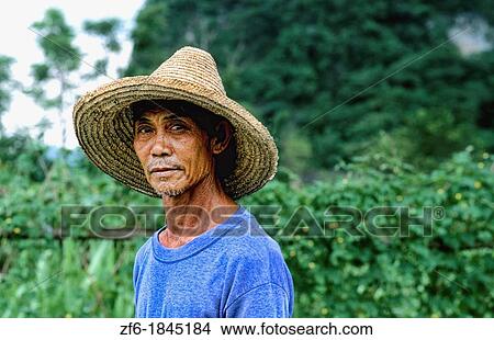 Colorful portrait of Chinese famrmer on farm in Guilin China View Large Photo Image Picture - Colorful portrait of Chinese famrmer on farm in Guilin China. Fotosearch