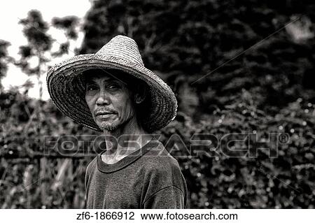 Colorful portrait of Chinese famrmer on farm in Guilin China View Large Photo Image Stock Image - Colorful portrait of Chinese famrmer on farm in Guilin China. Fotosearch