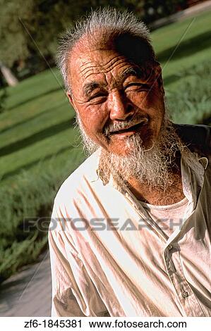 Colorful portrait of elderly Chinese man with beard in Beijing China. View Large Photo Image Stock Image - Colorful portrait of elderly Chinese man with beard in Beijing China.. Fotosearch