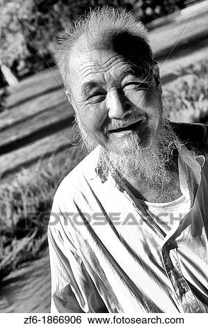 Colorful portrait of elderly Chinese man with beard in Beijing China View Large Photo Image Stock Photograph - Colorful portrait of elderly Chinese man with beard in Beijing China. Fotosearch