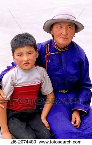 Stock Image - Colorful Portrait of Native Woman and her son in Ulaan Baatar Mongolia.. Fotosearch