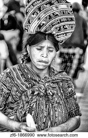 Colorful print patterned clothes of the women in the famous market day color of the Highlands in village of Solola Guatemala cover type vertical image View Large Photo Image Stock Image - Colorful print patterned clothes of the women in the famous market day color of the Highlands in village of Solola Guatemala cover type vertical image. Fotosearch
