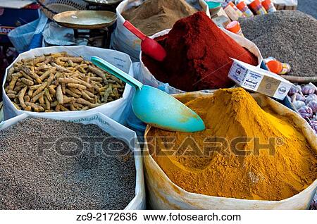 Colorful spicies at a streets stall in the market area of the ancient medina, Tiznit, Morocco. View Large Photo Image Stock Photograph - Colorful spicies at a streets stall in the market area of the ancient medina, Tiznit, Morocco.. Fotosearch