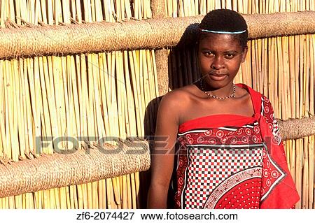 Colorful Woman in Tradtional Dress at a Cultural Village in Swaziland Village. View Large Photo Image Stock Photo - Colorful Woman in Tradtional Dress at a Cultural Village in Swaziland Village.. Fotosearch