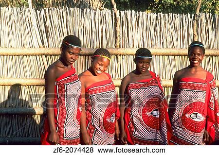 Colorful Women in Tradtional Dress at a Cultural Village in Swaziland Village. View Large Photo Image Stock Photo - Colorful Women in Tradtional Dress at a Cultural Village in Swaziland Village.. Fotosearch