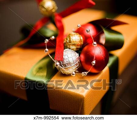 Colorfuly and elegantly wrapped Christmas gift View Large Photo Image Picture - Colorfuly and elegantly wrapped Christmas gift. Fotosearch