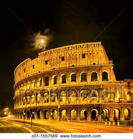Colosseo, Colosseum at night, car traffic, moon, Rome, Italy View Large Photo Image Stock Photo - Colosseo, Colosseum at night, car traffic, moon, Rome, Italy. Fotosearch
