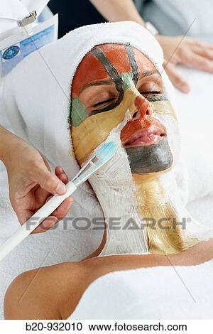 Stock Image - Colour energy, mud mask for facial treatment, Spa-relais. Fotosearch