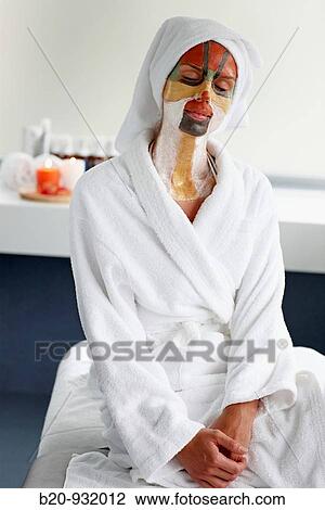 Stock Image - Colour energy, mud mask for facial treatment, Spa-relais. Fotosearch