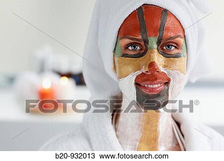 Stock Image - Colour energy, mud mask for facial treatment, Spa-relais. Fotosearch