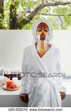Stock Photograph - Colour energy, mud mask for facial treatment, Spa-relais. Fotosearch