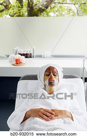 Stock Photography - Colour energy, mud mask for facial treatment, Spa-relais. Fotosearch