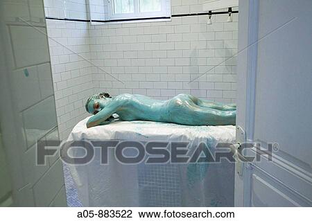 Stock Image - Colour energy, turquoise wrap body treatment in spa, Lierganes. Pas-Miera, Cantabria, Spain. Fotosearch