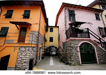 Colour houses in a square of Brugnato, La Spezia province, Liguria, Italy View Large Photo Image Stock Image - Colour houses in a square of Brugnato, La Spezia province, Liguria, Italy. Fotosearch