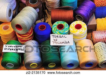 Colour thread in a shop window, Madrid, Spain View Large Photo Image Stock Image - Colour thread in a shop window, Madrid, Spain. Fotosearch