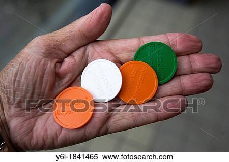 Coloured tokens for drinks and gift Heineken Experience Amsterdam The Netherlands View Large Photo Image Stock Photography - Coloured tokens for drinks and gift Heineken Experience Amsterdam The Netherlands. Fotosearch