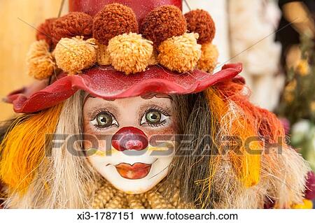Colourful clown doll for sale outside a shop, Oia, Santorini, Greece View Large Photo Image Stock Image - Colourful clown doll for sale outside a shop, Oia, Santorini, Greece. Fotosearch