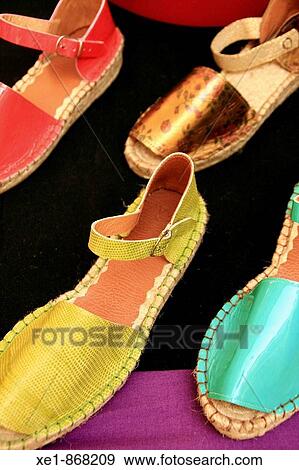 Stock Photo - Colourful Minorcan sandals at fair. Caldes de Montbui, Barcelona province, Catalonia, Spain. Fotosearch