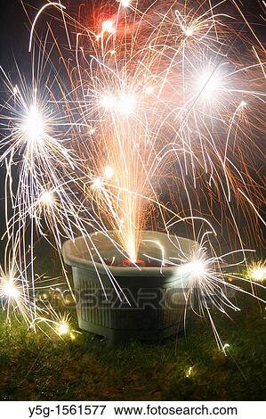 colourful sparks in fireworks display in garden View Large Photo Image Stock Photo - colourful sparks in fireworks display in garden. Fotosearch